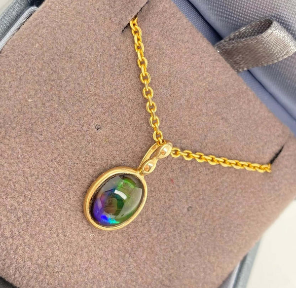Ammolite Gold Oval Pendant with 8x10mm Gemstone Left View PN E033713 